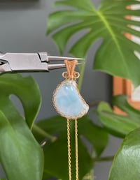 Image 1 of Gold Larimar Moon Crystal Necklace