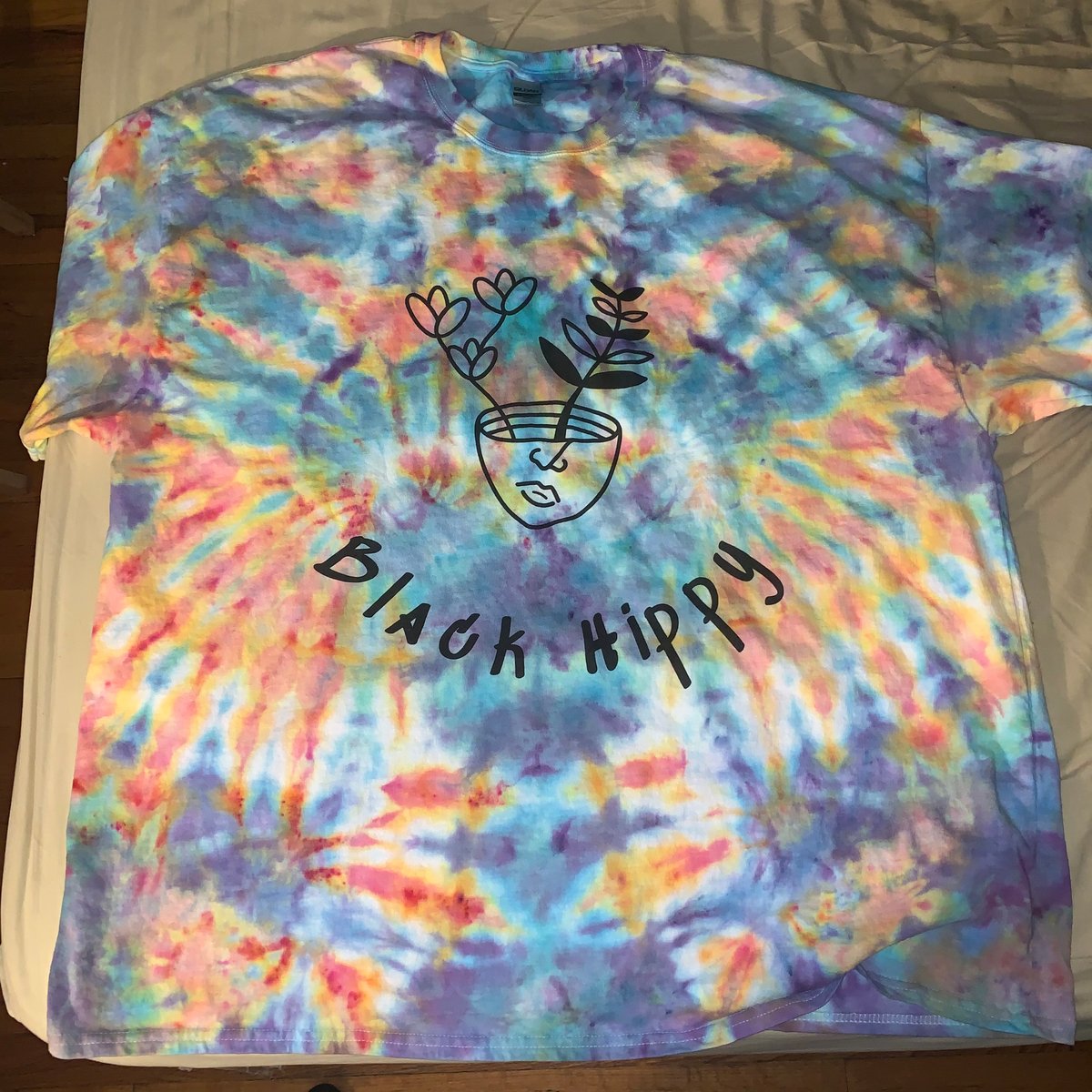 can you tie dye a shirt with a logo on it
