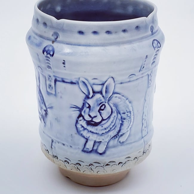 Rabbit Frolic Bas Relief Cobalt Vase