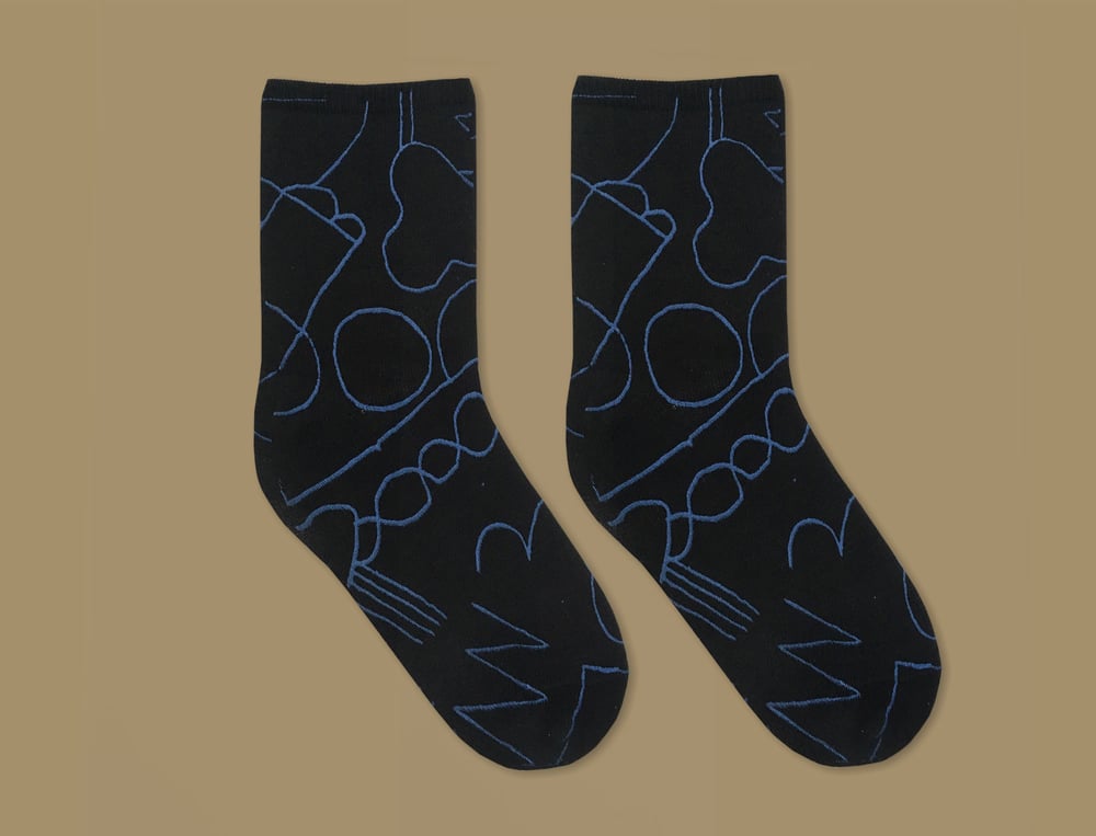 Image of BLACK SOCKS WITH BLUE DRAWING