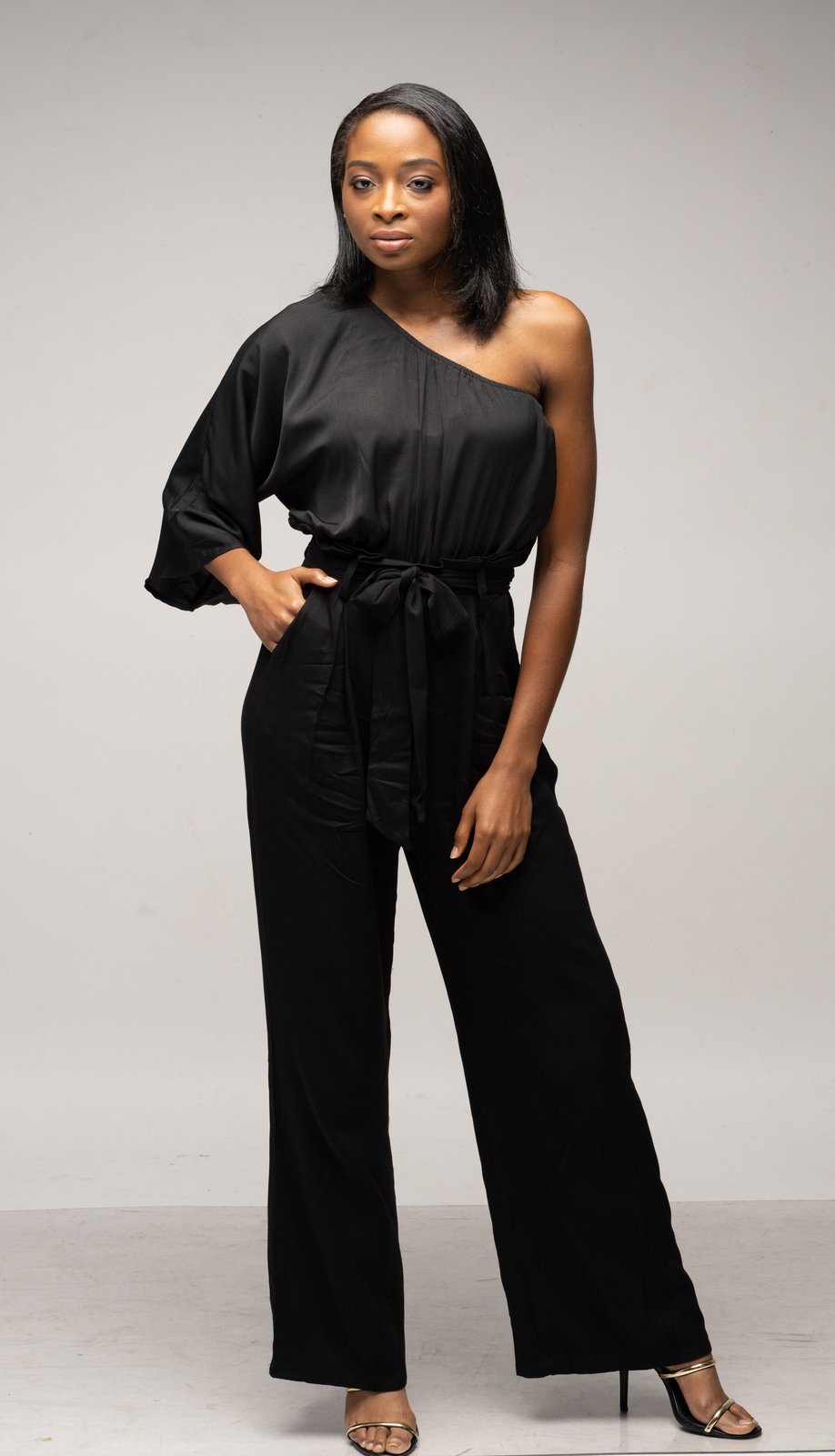 black belted one shoulder jumpsuit