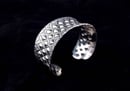 Image 1 of Anticlastic Stamped Dragon Skin Cuff