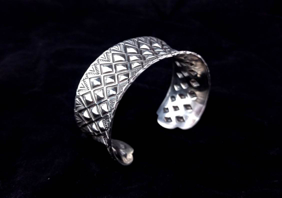 Image of Anticlastic Stamped Dragon Skin Cuff