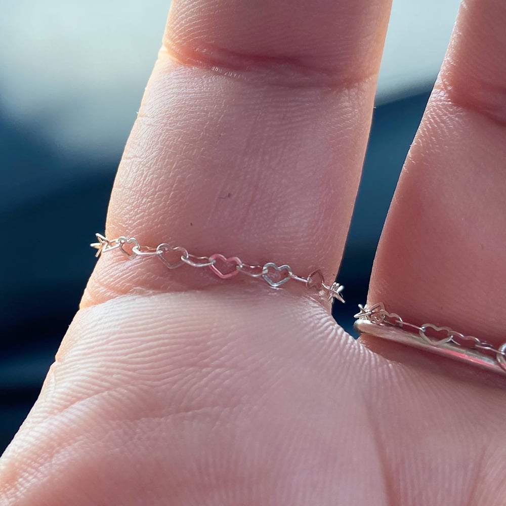 Image of Anatomical heart and chain ring