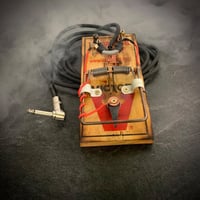 Rat trap foot pedal w/ clip cord