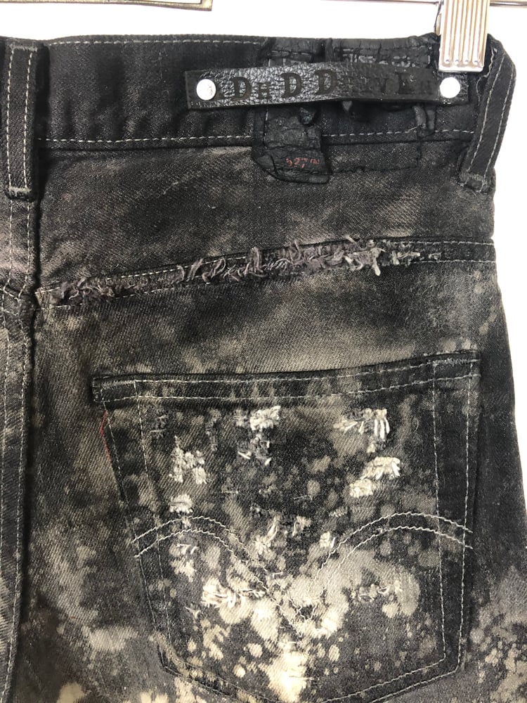 Image of Waxed denim shorts 