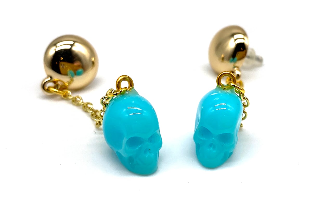 Image of Skull Dangle earrings blue
