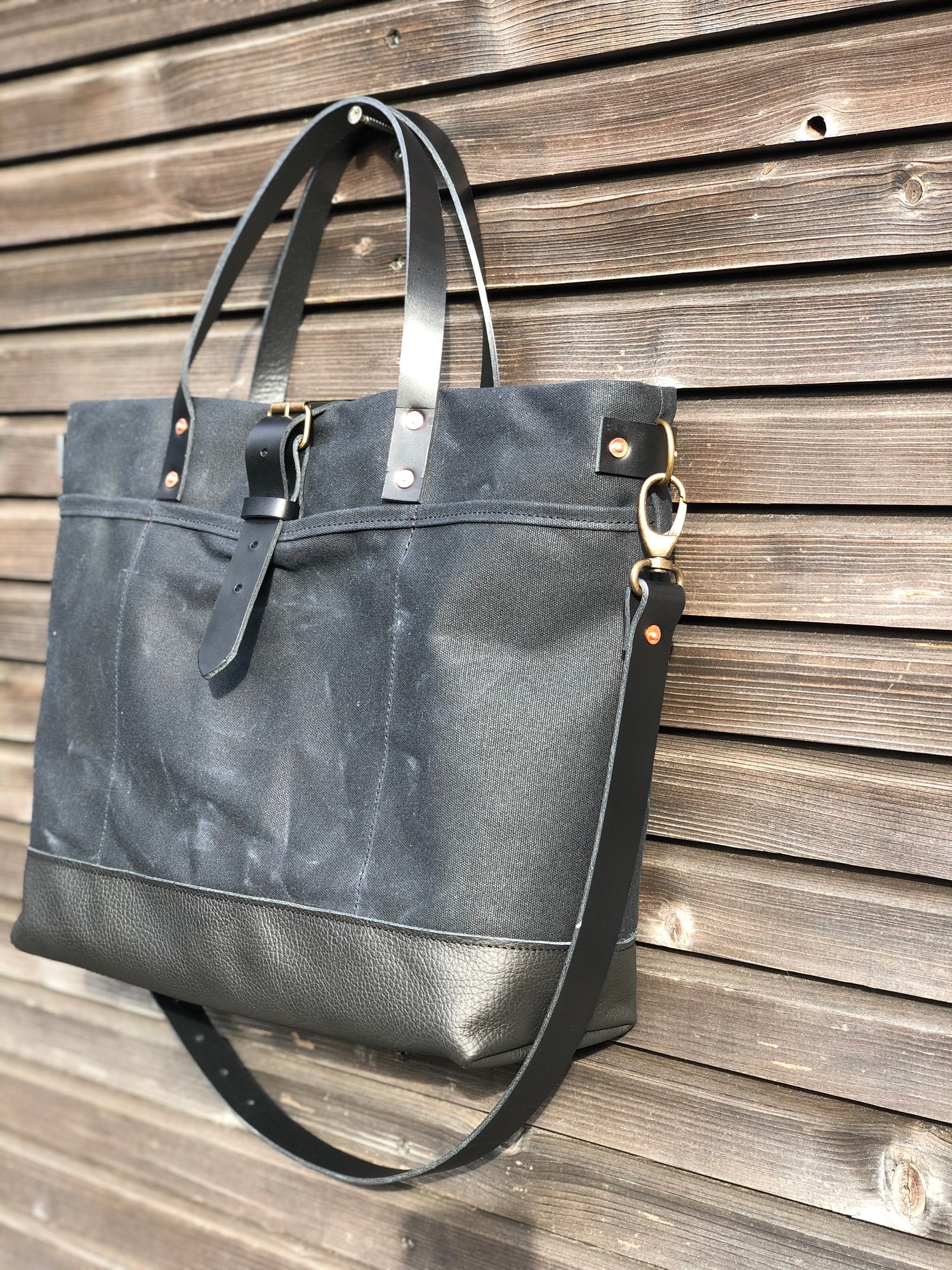 Black tote bag in waxed canvas with leather bottom and cross body strap ...