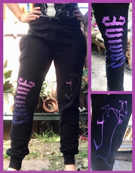 Image of Canine Black Fitted Tracksuit Pants With Purple Print