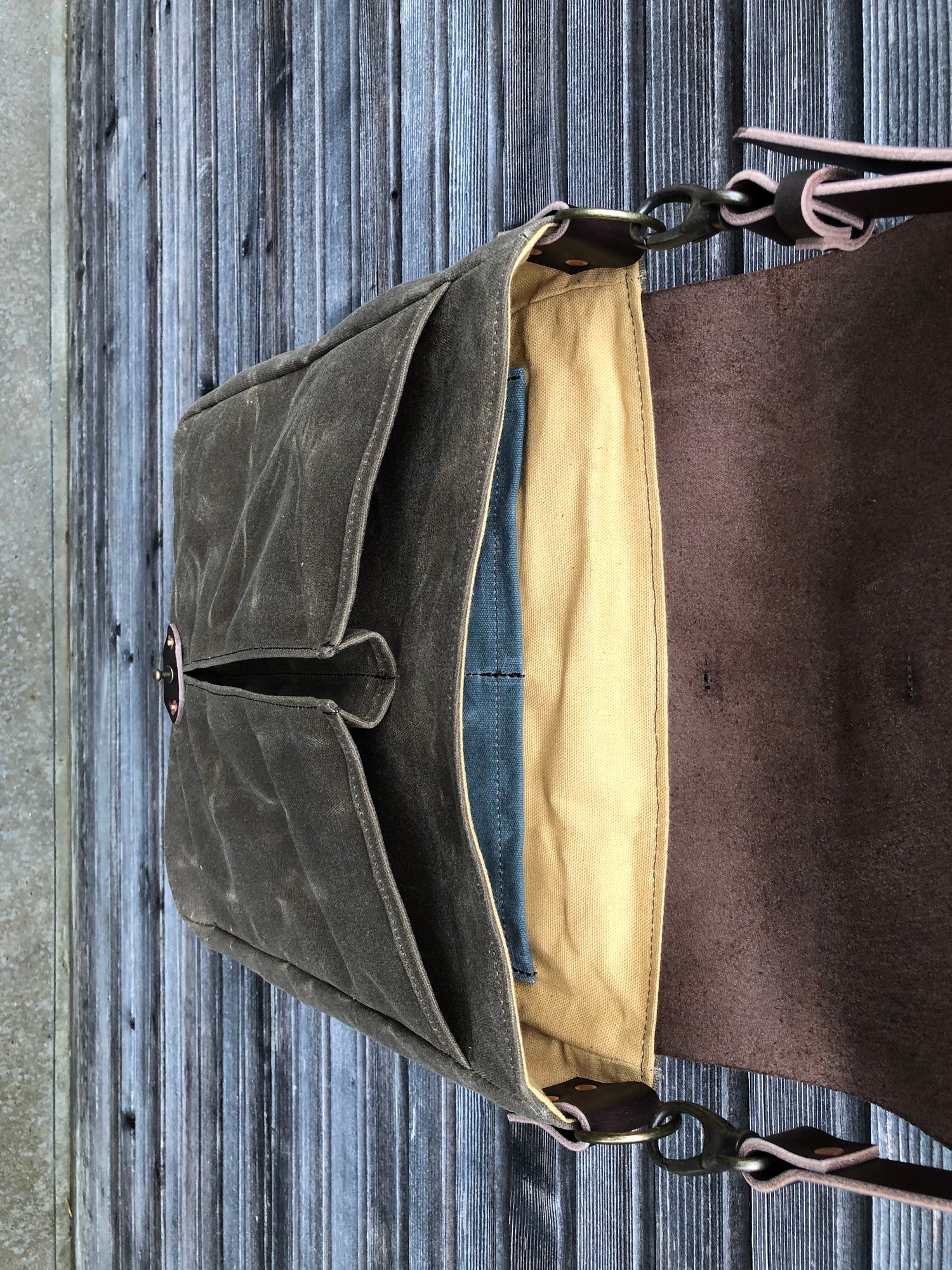 waxed canvas and leather messenger bag