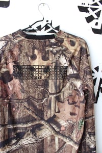 Image of locked and loaded long sleeve in forest camo