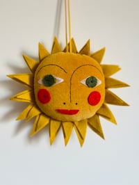 Image 2 of Gold Hanging Sun Charm 2