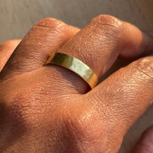 Image of Hammered 18ct yellow gold wedding band