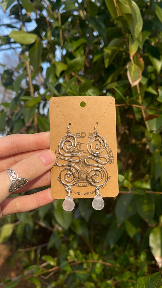 Image of Crystal swirl drop earrings