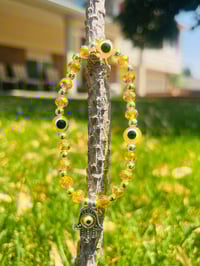 Yellow Crystal Evil Eye Hand 
