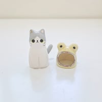Image 3 of Gray and white cat with frog hat ceramic figurine (white gold version)