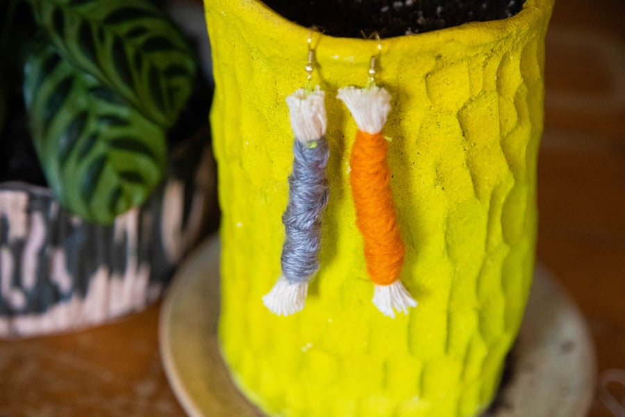 Image of grey/orange wrapped up earrings 