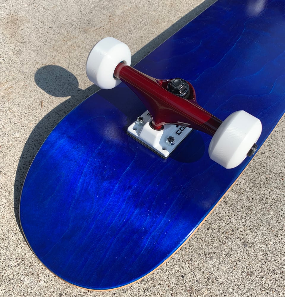 Image of Blue Stained Complete Skateboard w/ Metallic Red Trucks