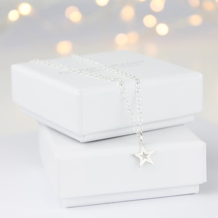 Image of Cut out silver star necklace