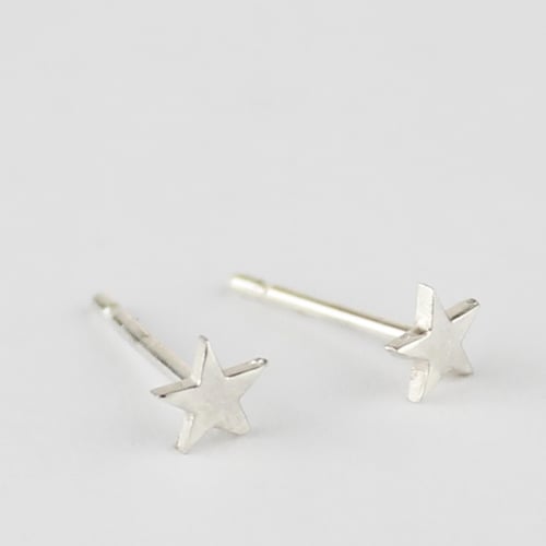 Image of Teeny silver star studs 