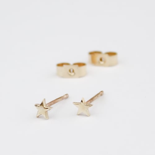 Image of Teeny gold star stud earrings