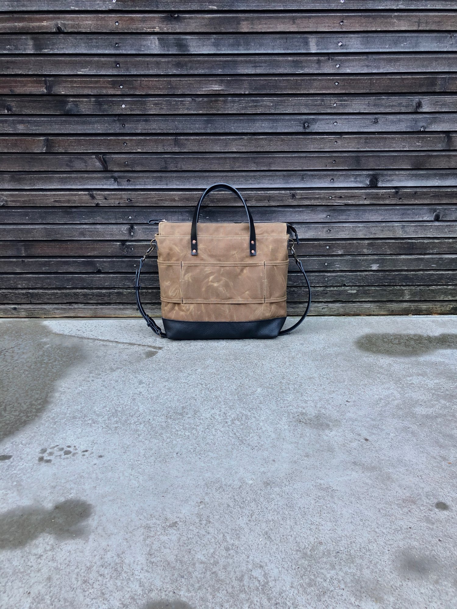 Image of Office tote bag in waxed canvas with luggage handle attachment leather handles and shoulder strap
