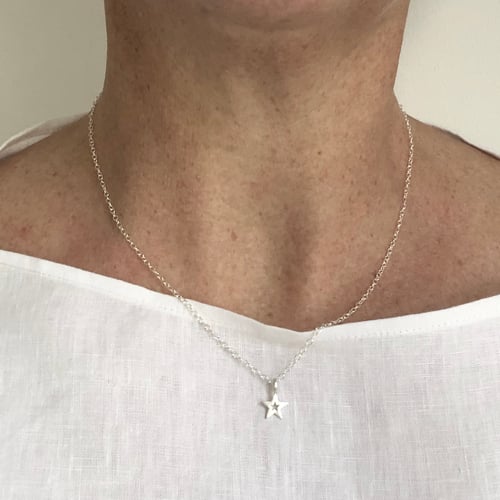 Image of Cut out silver star necklace