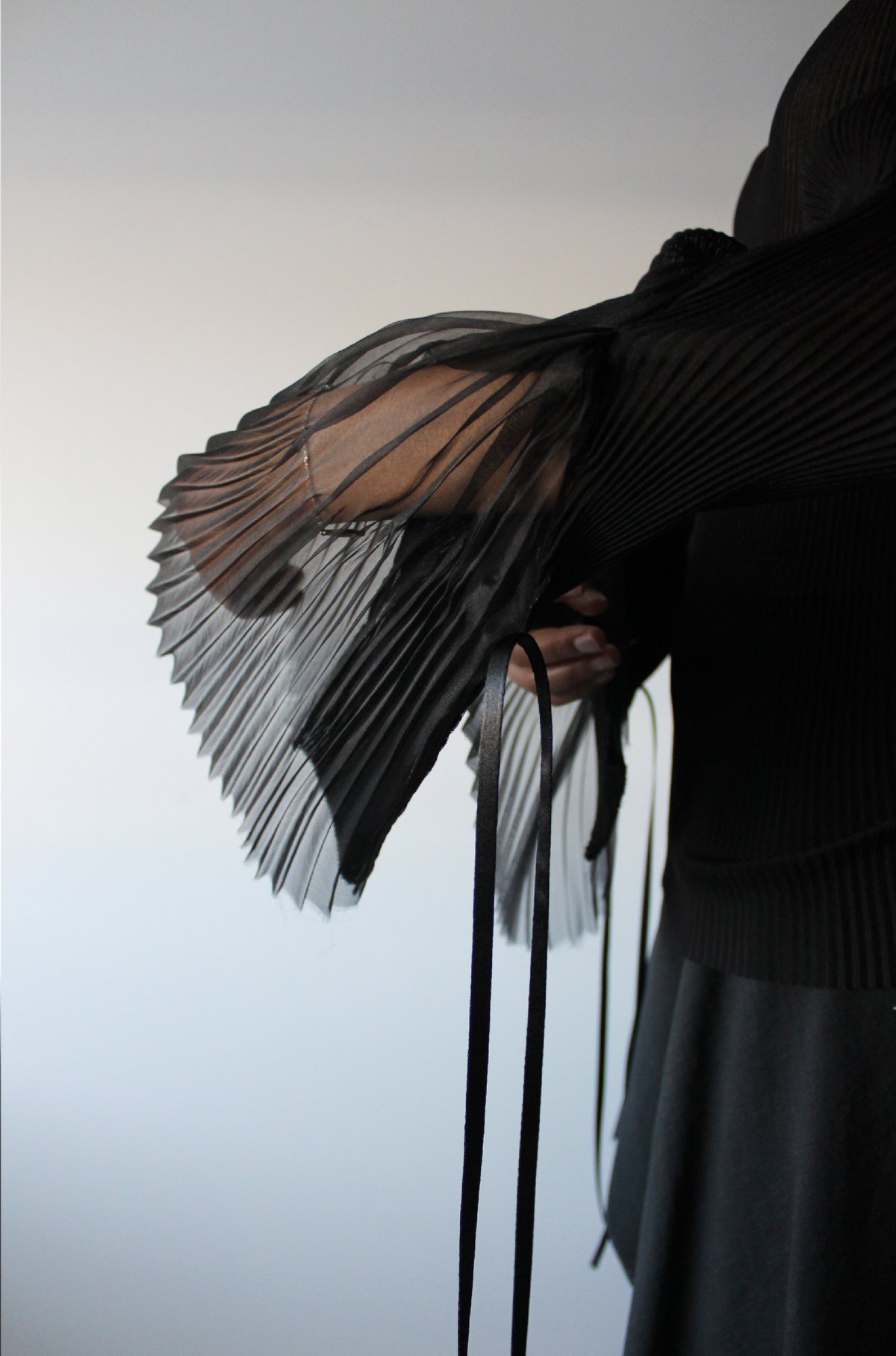 Pleated jersey top with silk pleats