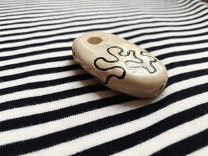 Image of Swirls of Coral Pipe