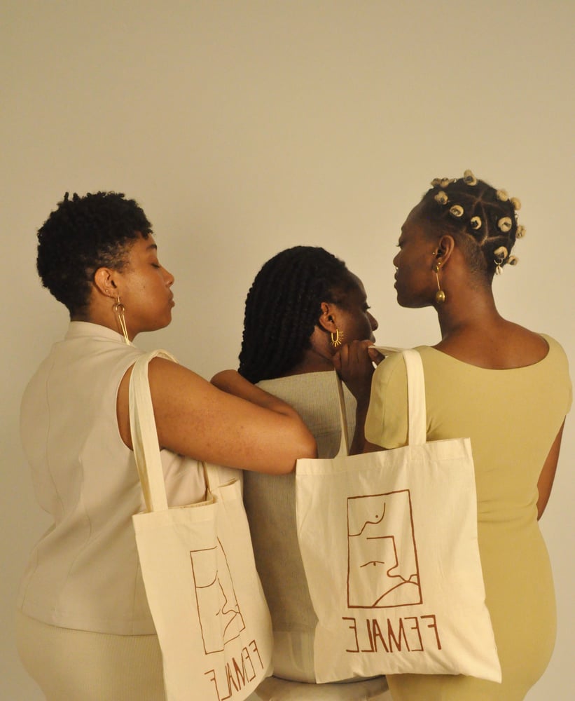 Image of female tote