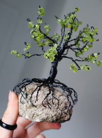 Peridot Chip Black Wire Tree on Forest Rock