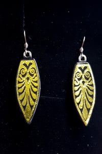 Bright gold  or silver dichroic glass leaf earrings