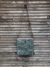 Image 5 of Satchel / musette in waxed canvas with hand waxed leather flap and adjustable shoulder strap UNISEX
