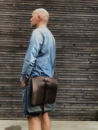 Image 2 of Satchel / musette in waxed canvas with hand waxed leather flap and adjustable shoulder strap UNISEX