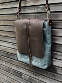 Image 3 of Satchel / musette in waxed canvas with hand waxed leather flap and adjustable shoulder strap UNISEX