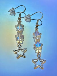 Image 2 of shooting star holographic earrings