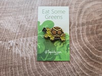 Image 1 of Turtle Eating Leaf Enamel Pin