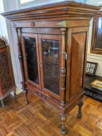 Tall Teak-Wood Cupboard.