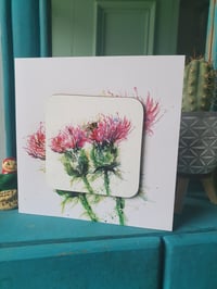 Twa' Thistles