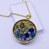 gold mounted 'fleur de lis' chain | blue