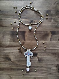 Image 1 of Collana 'Chiave segreta e stelle'
