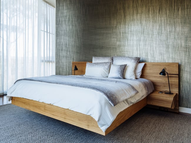 FLOATING BED WITH CLIPPED WING DRAWERS IN BLACKBUTT