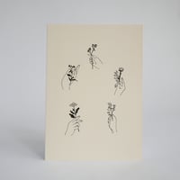 Image 2 of Hands Holding Flowers