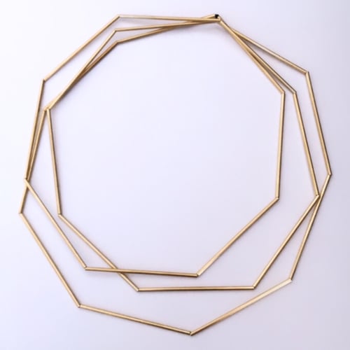 Image of Collaret geomètric or 3 voltes. Collar geométrico oro 3.