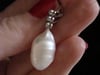 18ct white gold large baroque pearl and diamond pendant 