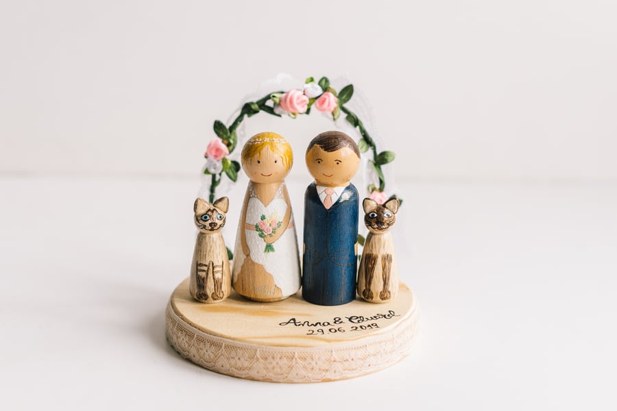 Image of Figuras de boda personalizadas + Arco de Flores
