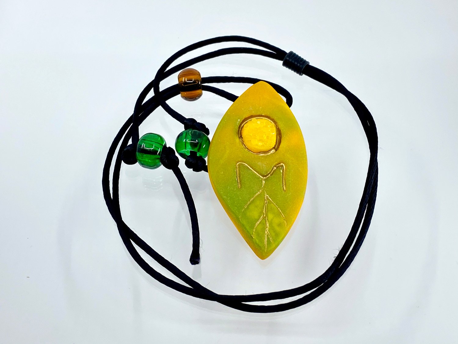 Image of Pate de Verre Glass "OM" Lotus Petal Shaped Pendant in Yellows and Greens