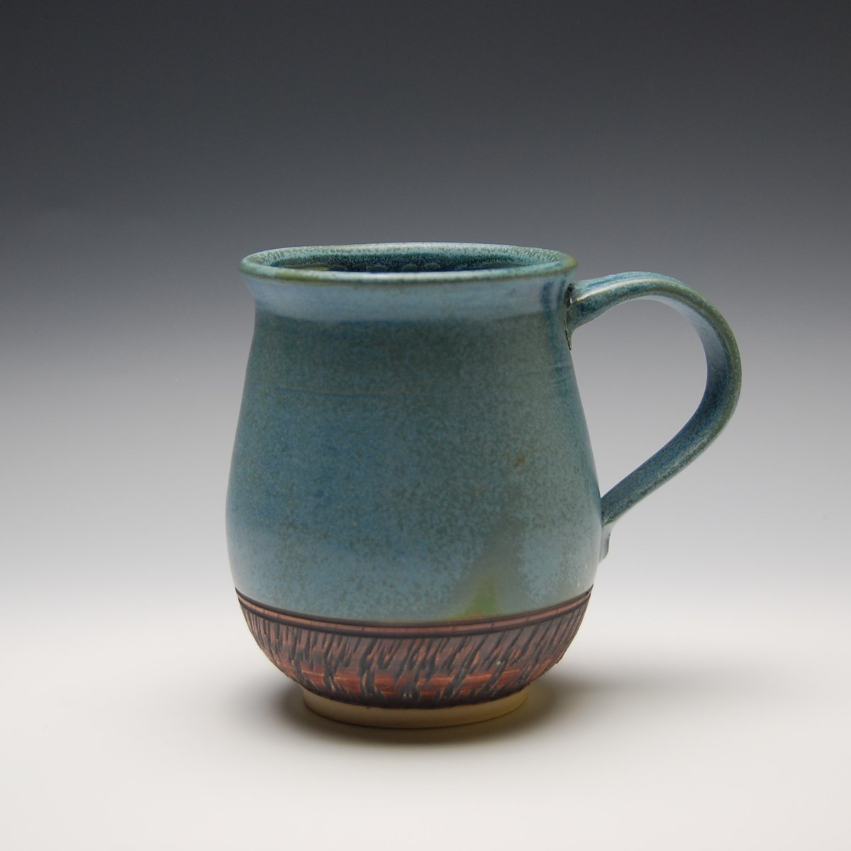 Image of Mug in sky blue glaze with chattering