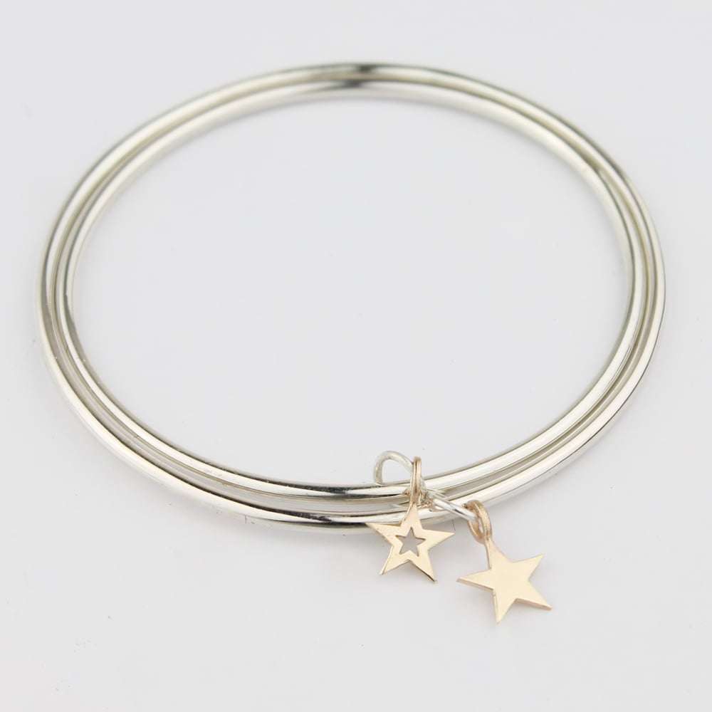 Image of Set of two star bangles in silver and 9ct gold