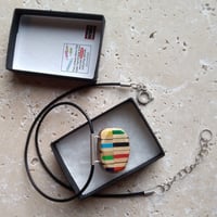 Image of stripy recycled pencil pendant